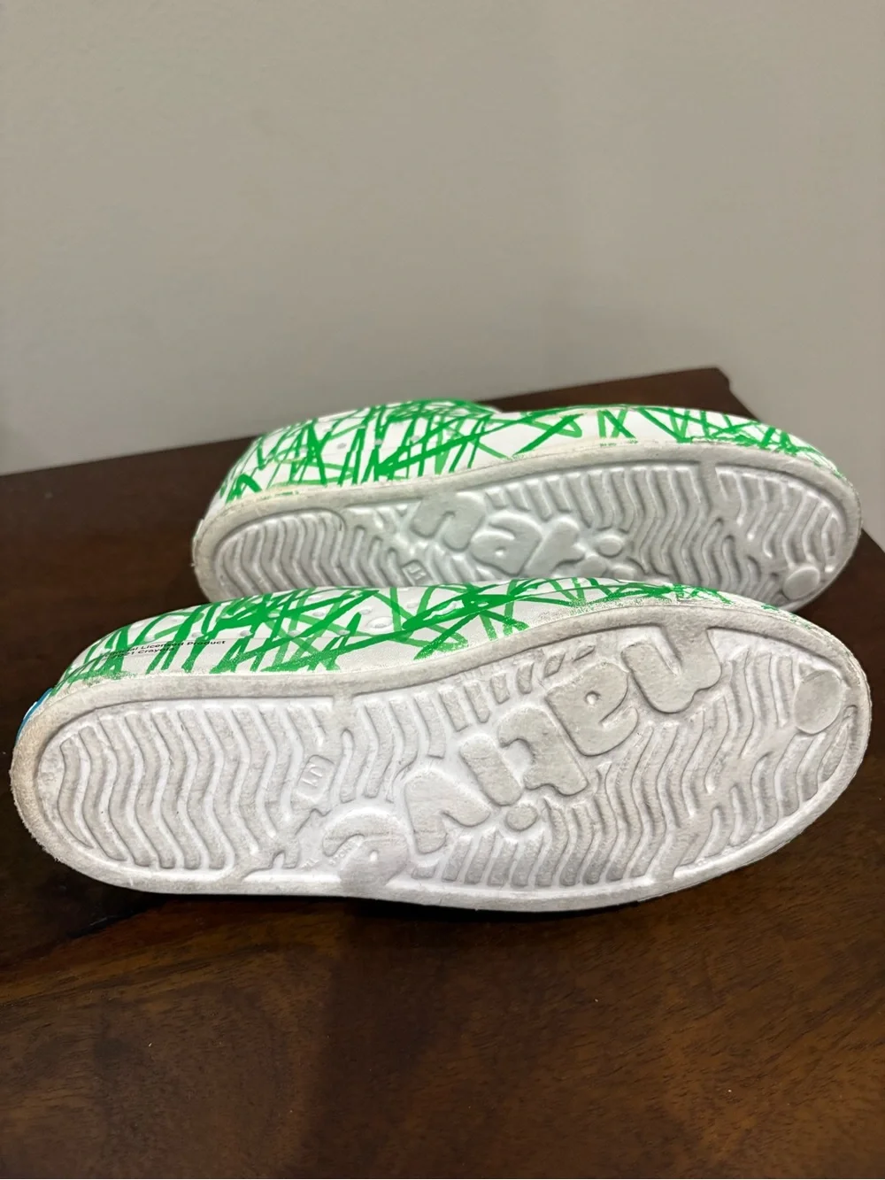 Native Kids White Slip-Ons with Green Grass Print